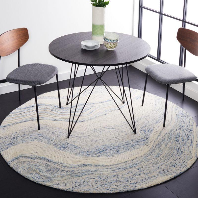 Round Blue and Ivory Tufted Wool Area Rug