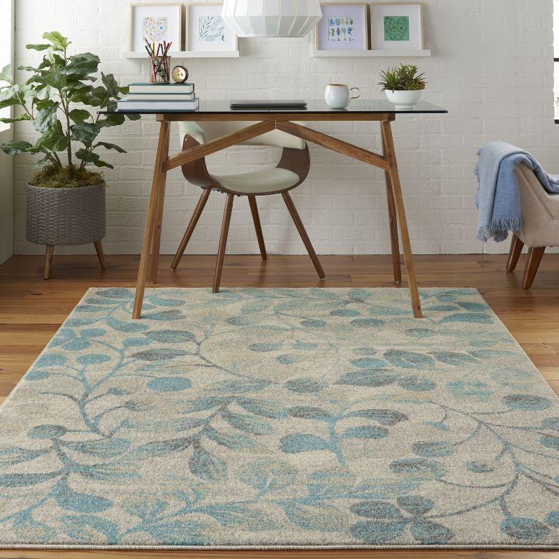 Ivory and Turquoise Floral Synthetic 4' x 6' Area Rug