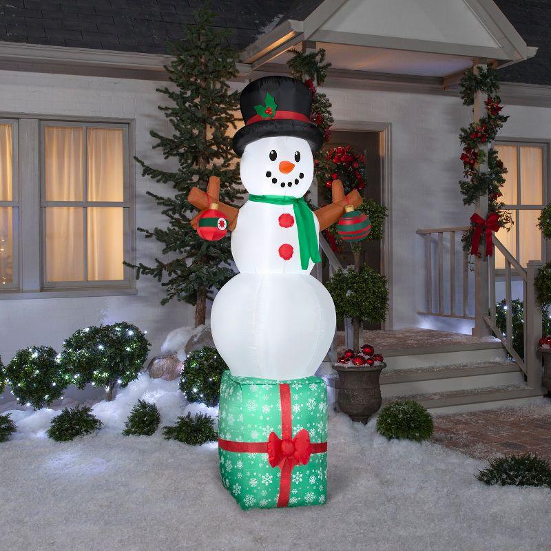 Giant 10-ft Inflatable Snowman on Gift Box with Ornaments