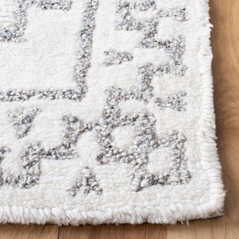 Ivory Shag Elegance 9' x 12' Hand-Tufted Wool Blend Area Rug