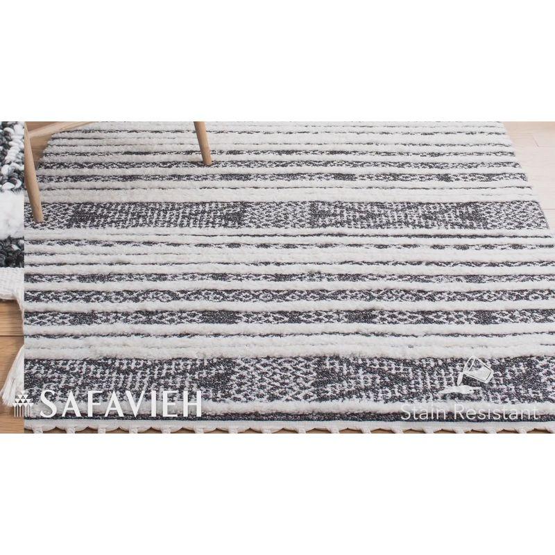 Moroccan Tassel Shag MTS632 Power Loomed Area Rug - Black/Ivory - 3'x5' - Safavieh.
