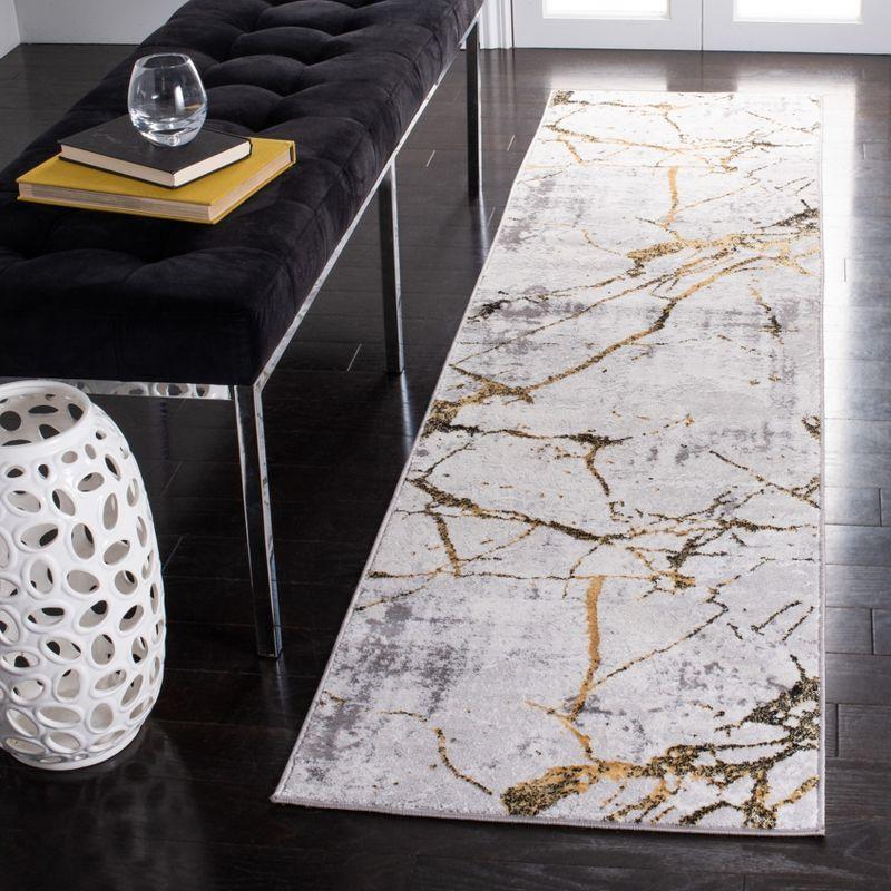 Elysian 24'' Gray and Gold Abstract Synthetic Runner Rug