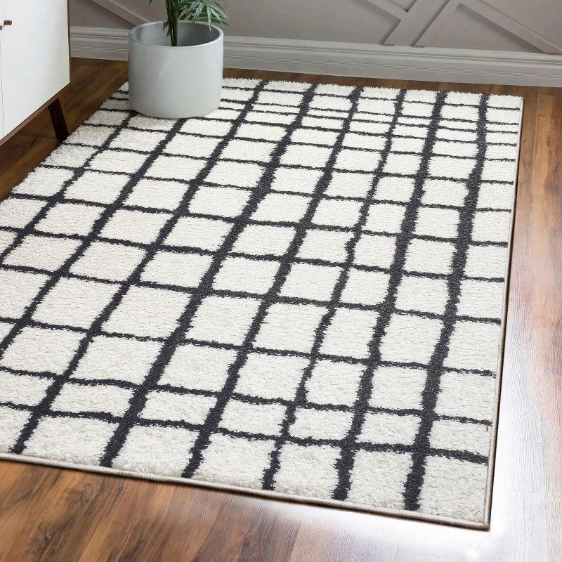 4'x6' Arenal Geometric Grid Shag Area Rug, White/Black - JONATHAN Y