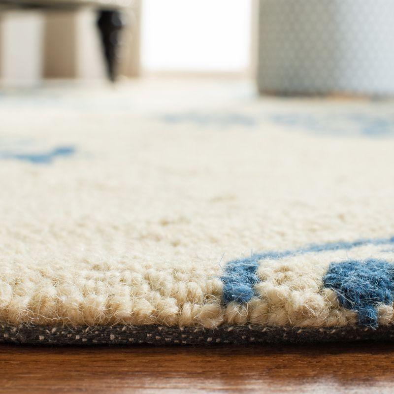Chelsea HK145 Handmade Area Rug - 3'9"x5'9" - Ivory/Blue - Safavieh