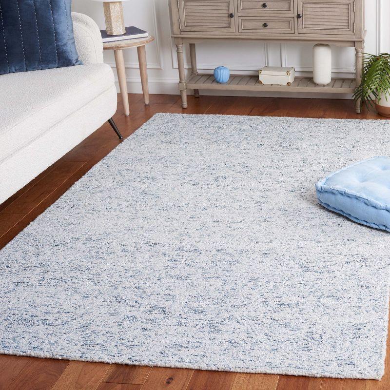 Light Blue Hand Tufted Wool and Synthetic Area Rug, 4' x 6'