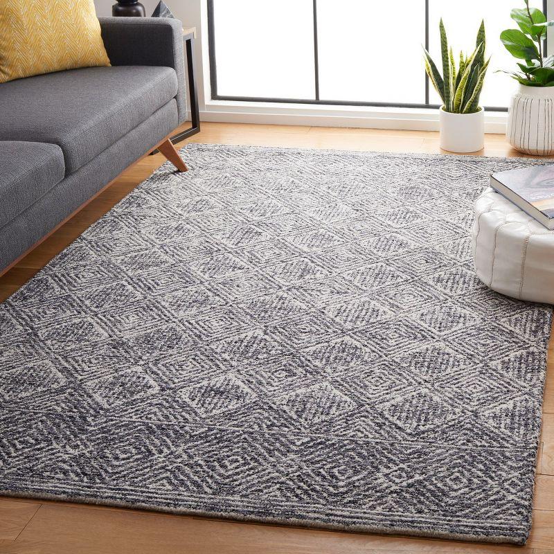 Charcoal and Ivory Hand Tufted Wool Area Rug 5' x 8'