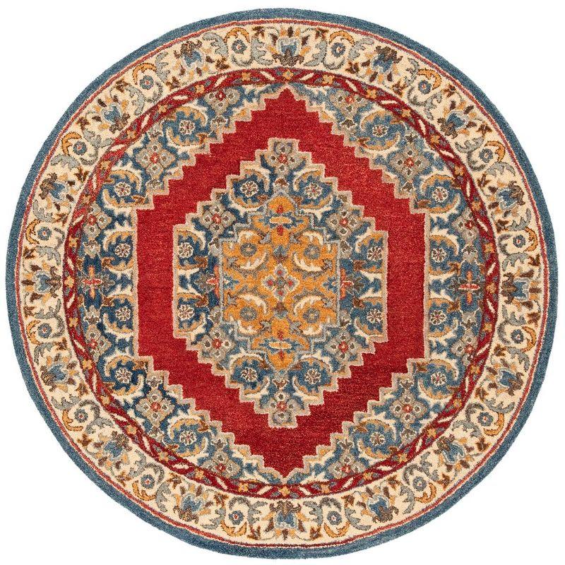 Antiquity AT505 Hand Tufted Area Rug - Blue/Red - 6' Round - Safavieh.