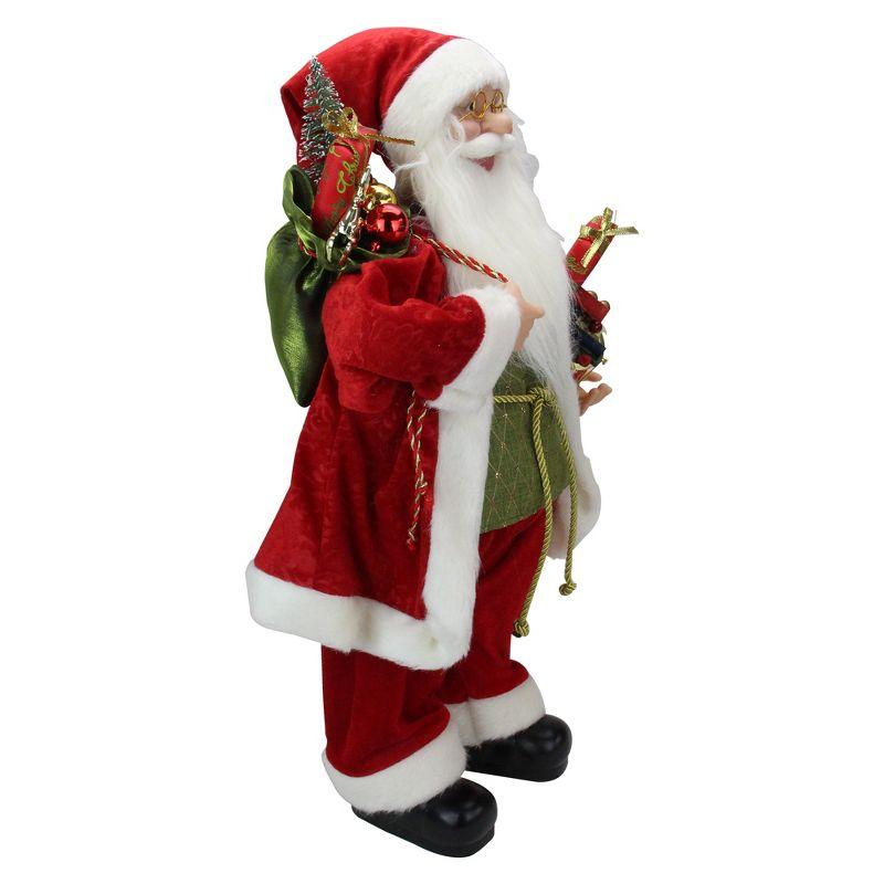 24" Red and White Santa Claus with Presents and Drum Christmas Figure