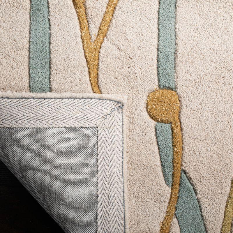 Soho SOH746 Hand Tufted Indoor Area Rug - Beige/Multi - 5'x8' - Safavieh