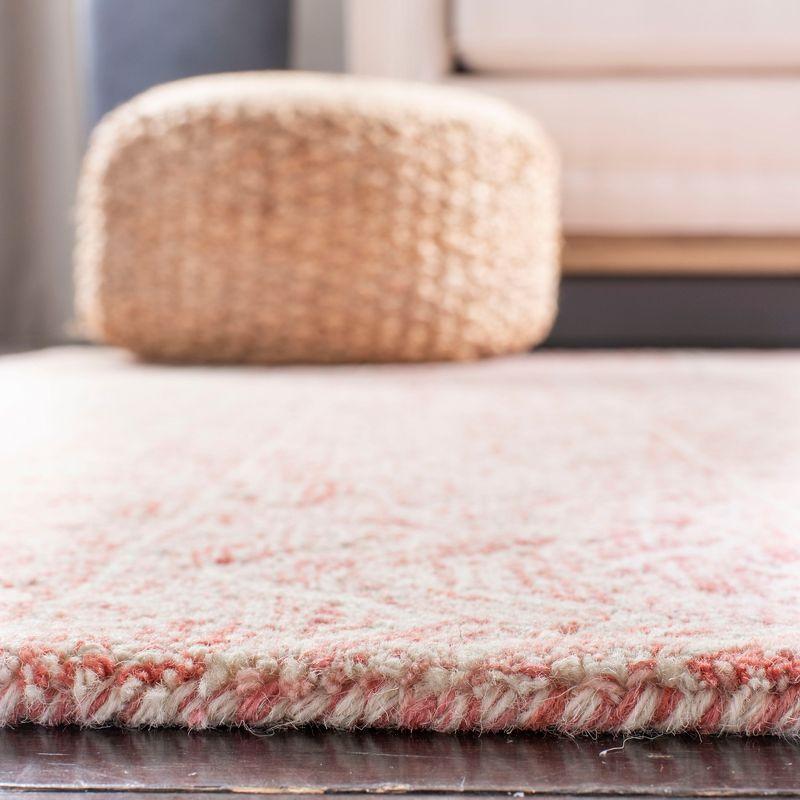 Hand-Tufted Round Pink/Ivory Wool 59" Rug with Non-Slip Feature