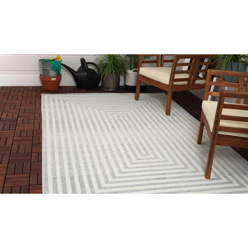 Beige Geometric 5' x 8' Synthetic Outdoor Area Rug