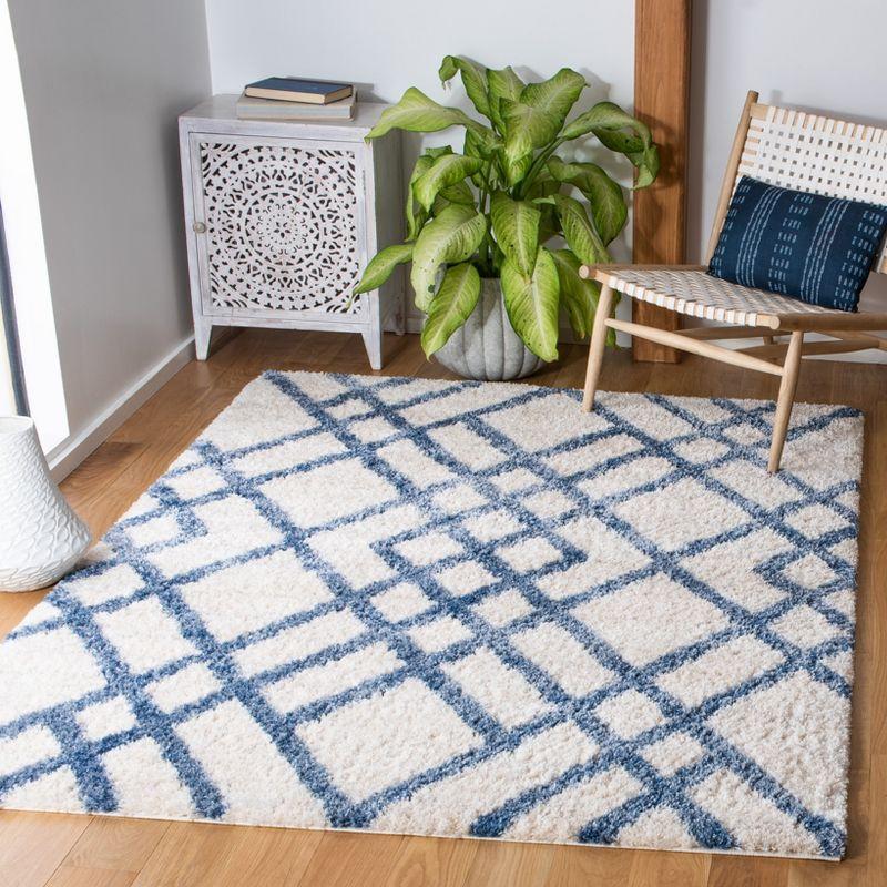 Ivory and Blue Geometric Shag Area Rug, 5'3" x 7'6"