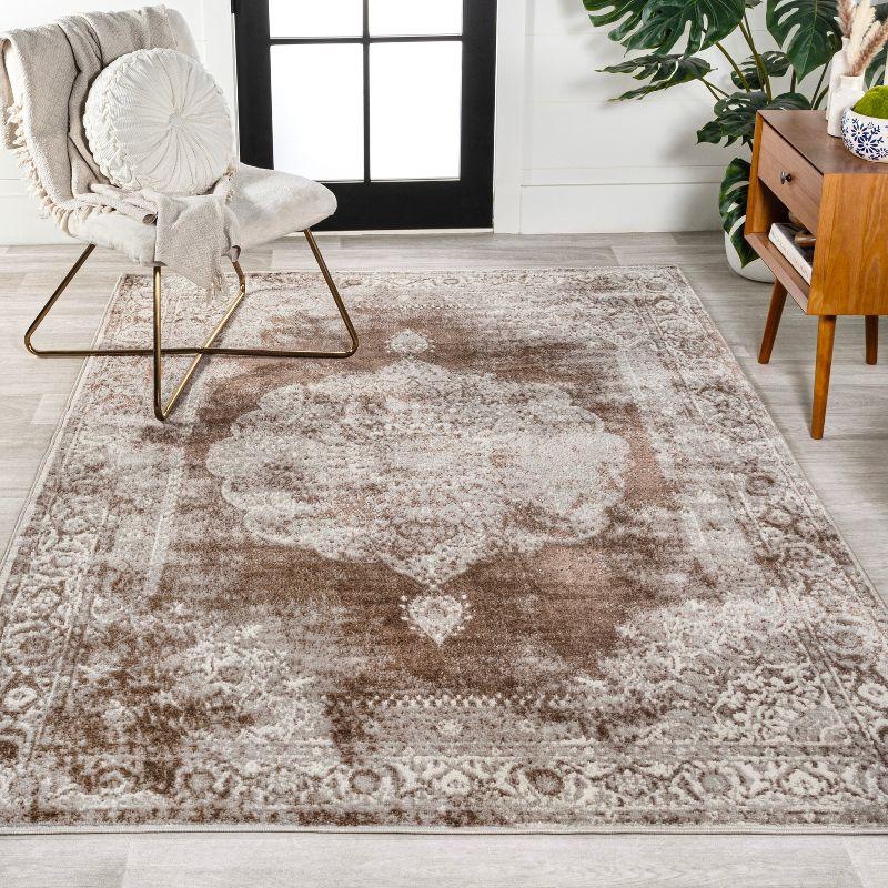 Ivory and Brown Medallion Synthetic 8' x 10' Area Rug