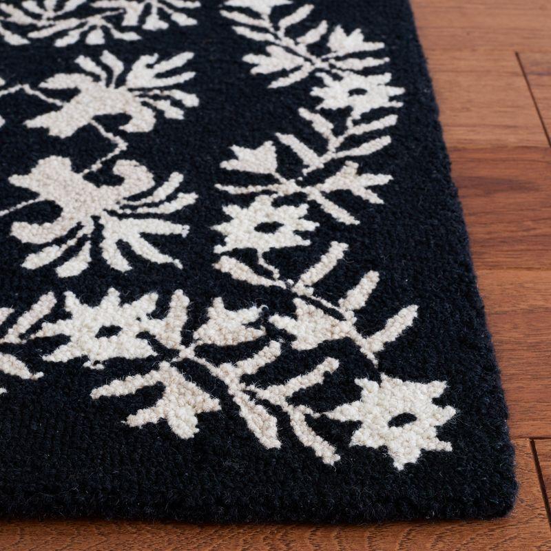 Empire Black and Ivory Hand-Tufted Wool Area Rug 8' x 10'