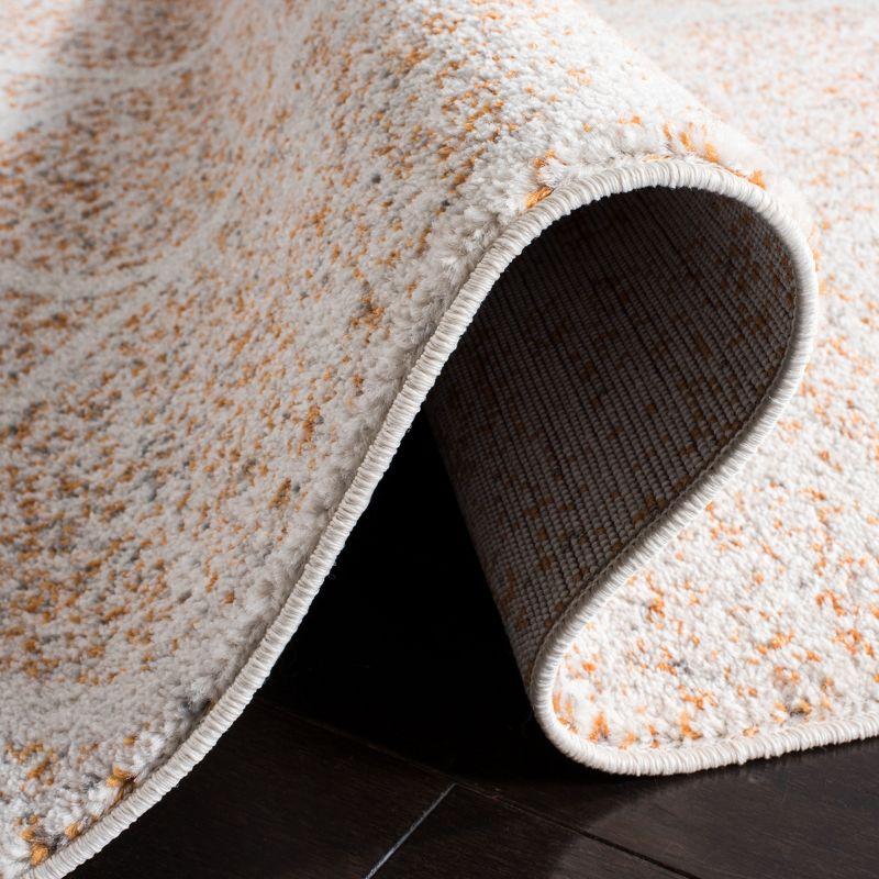 Metro-Mod Chic Cream & Orange Synthetic 26" Area Rug