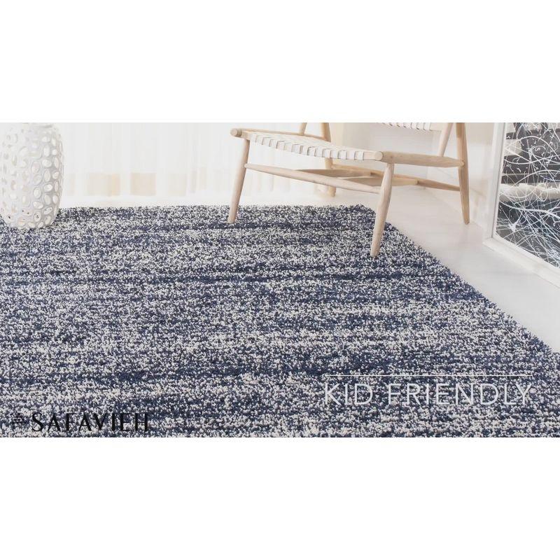 Audriauna Ivory/Navy Area Rug