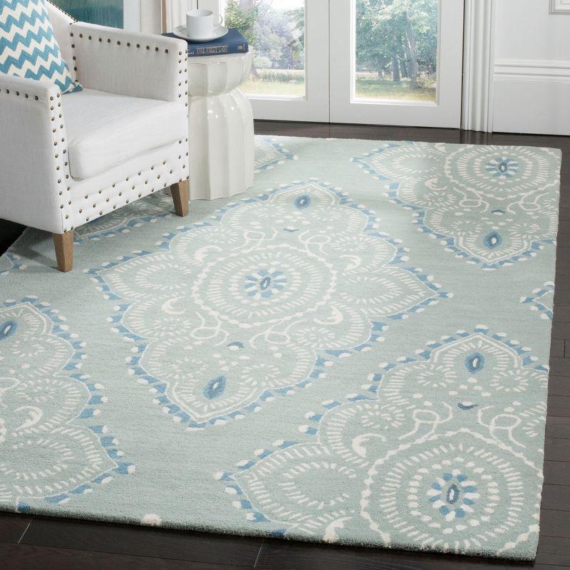 Blue and Ivory Hand-Tufted Wool 4' x 6' Area Rug