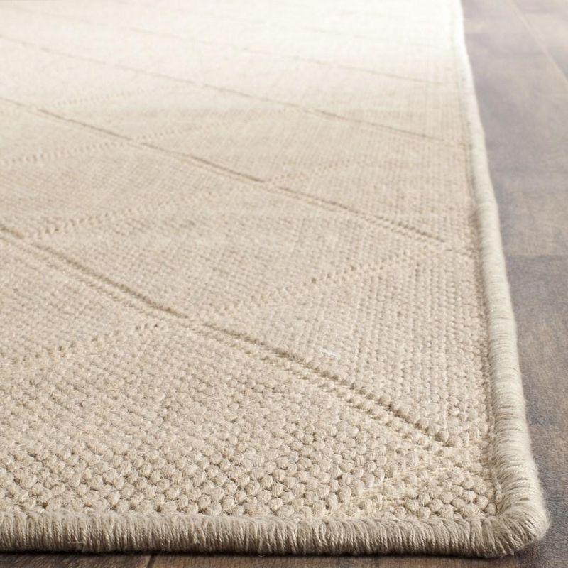 Handmade Geometric Synthetic 4' x 6' Rectangular Rug