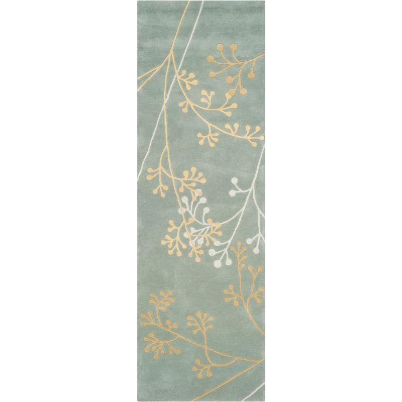 Soho SOH305 Hand Tufted Area Rug  - Safavieh