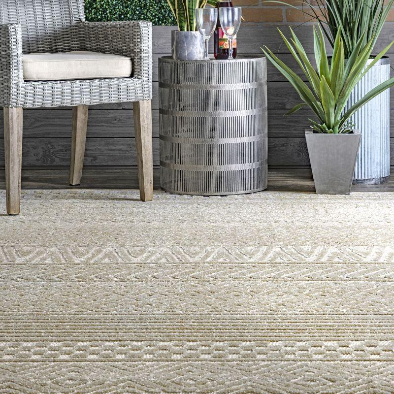 Beige 5' x 8' Easy-Care Synthetic Indoor/Outdoor Area Rug