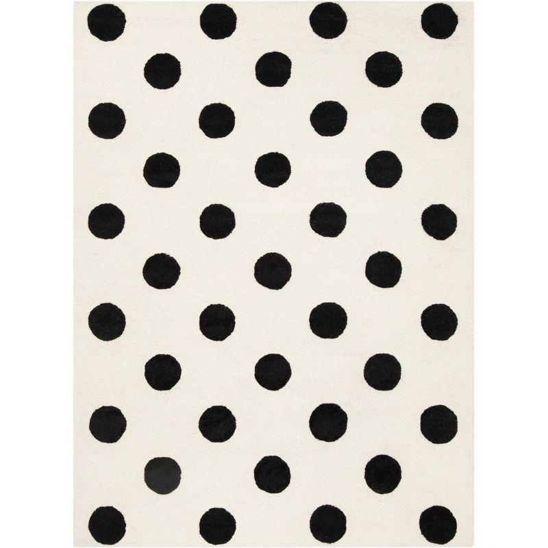 Safavieh Kids Polka Dots SFK904 Hand Tufted Indoor Area Rug - Ivory/Black - 5'x7' - Safavieh