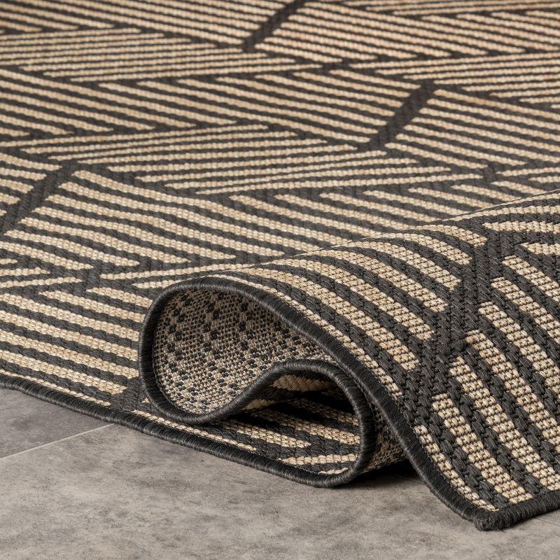 Reversible Charcoal Gray Geometric 4' x 6' Synthetic Area Rug