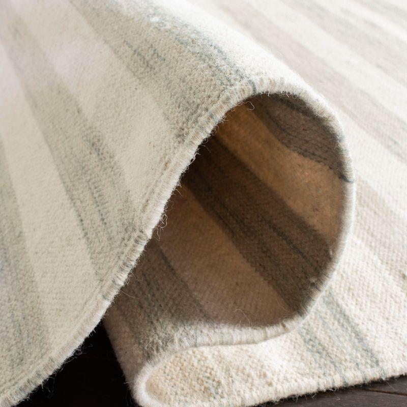 Dhurries DHU575 Hand Woven Flat Weave Area Rug Light Blue / Ivory 8' X 10' - Safavieh.