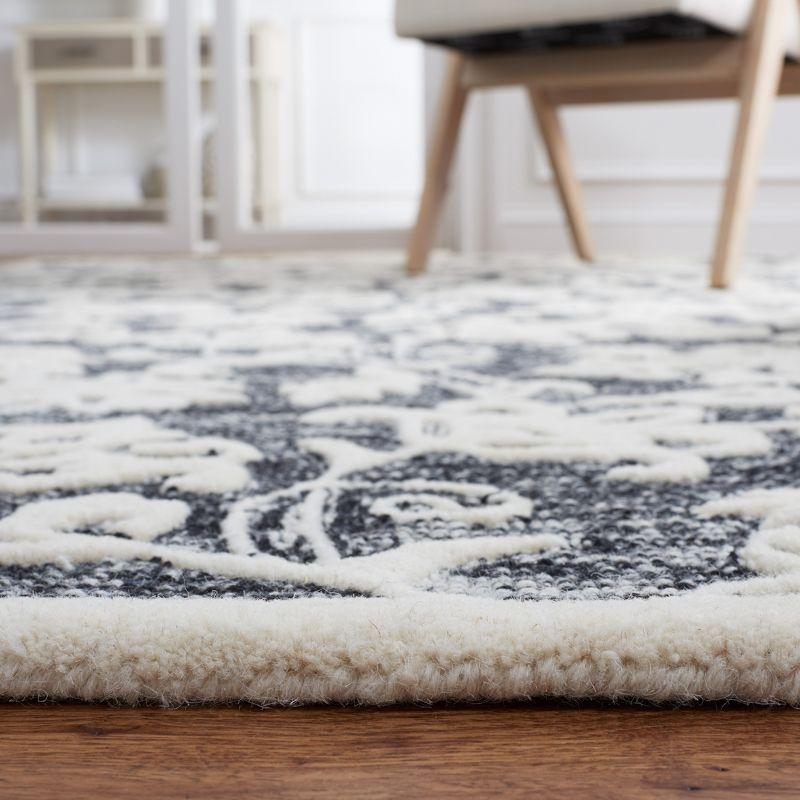 Metro MET853 Hand Tufted Indoor Area Rug - Black/Ivory - 6'x6' - Safavieh