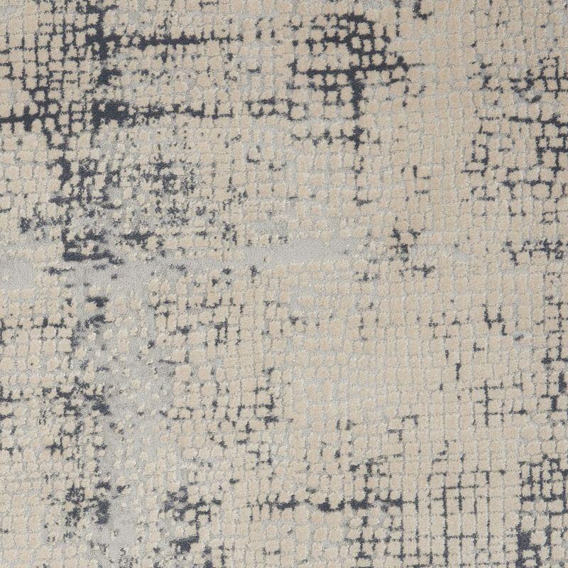 Ivory and Blue Abstract Synthetic 2'2" x 7'6" Area Rug