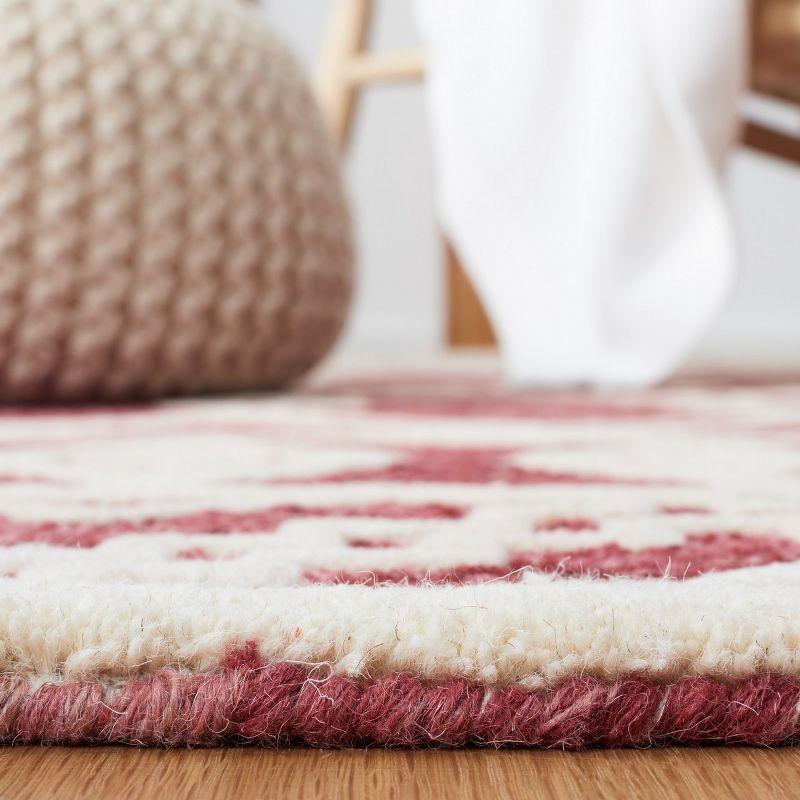 Abstract ABT851 Handmade Indoor Area Rug - Red/Ivory - 6' Round - Safavieh