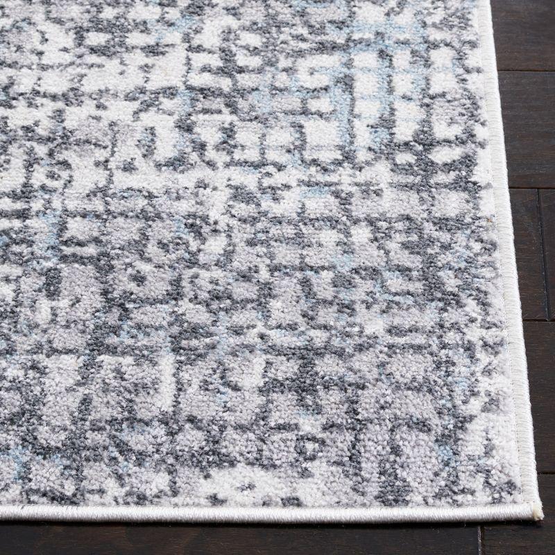 Ivory Abstract 4' x 6' Synthetic Easy Care Rug