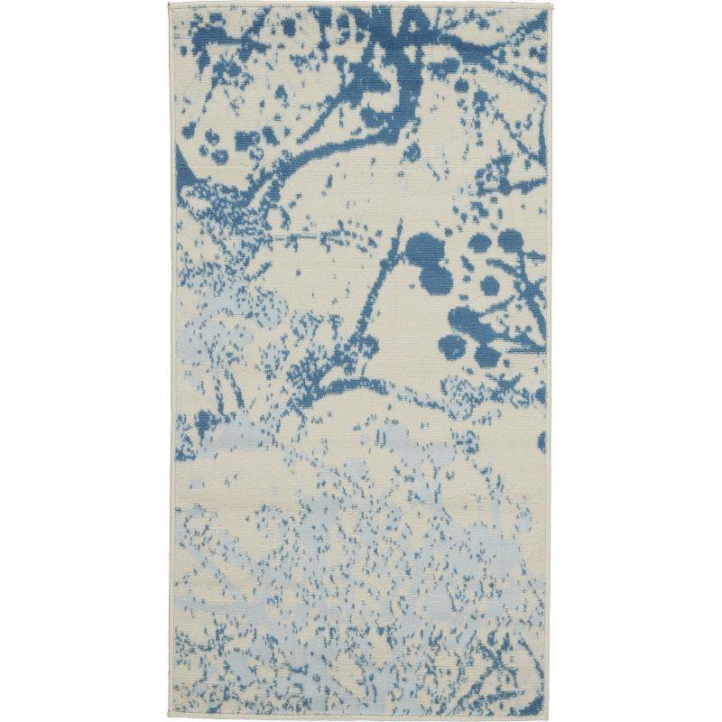 Ivory and Blue Abstract Synthetic 2' x 4' Easy-Care Area Rug