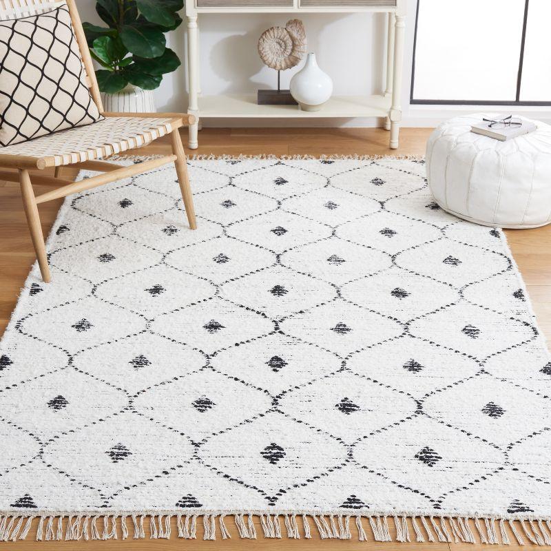 Ivory and Black Handmade Wool Shag Area Rug, 5 x 8 ft