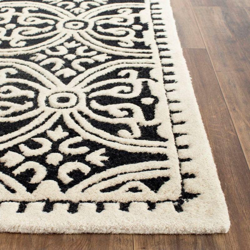 Cambridge CAM123 Hand Tufted Area Rug  - Safavieh