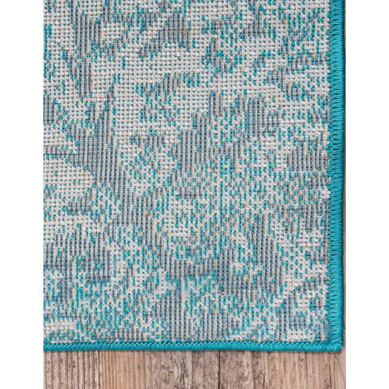 Reversible Easy-Care Turquoise Synthetic 6' x 9' Rectangular Rug