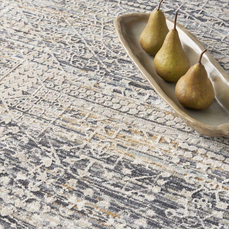 Nourison Nyle Boho Vintage Indoor Rug Ivory Slate 7’10” x Round