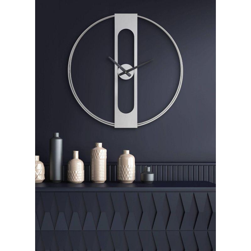 22"x22" Urgo Numberless Metal Wall Clock Silver - Kate & Laurel All Things Decor: Large, Modern Indoor Timepiece