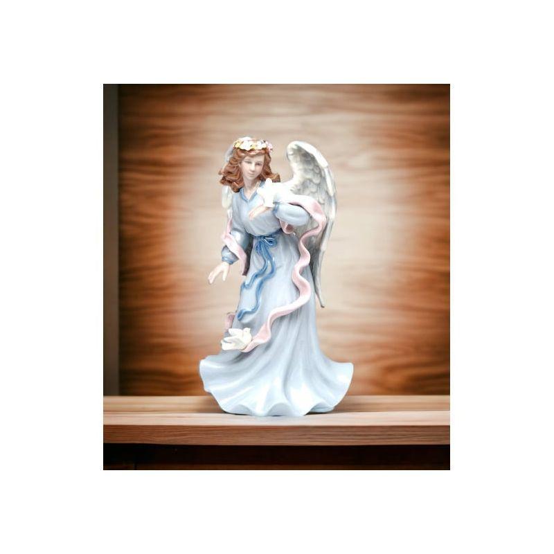 Kevins Gift Shoppe Ceramic Angel Holding Peace Dove Music Box