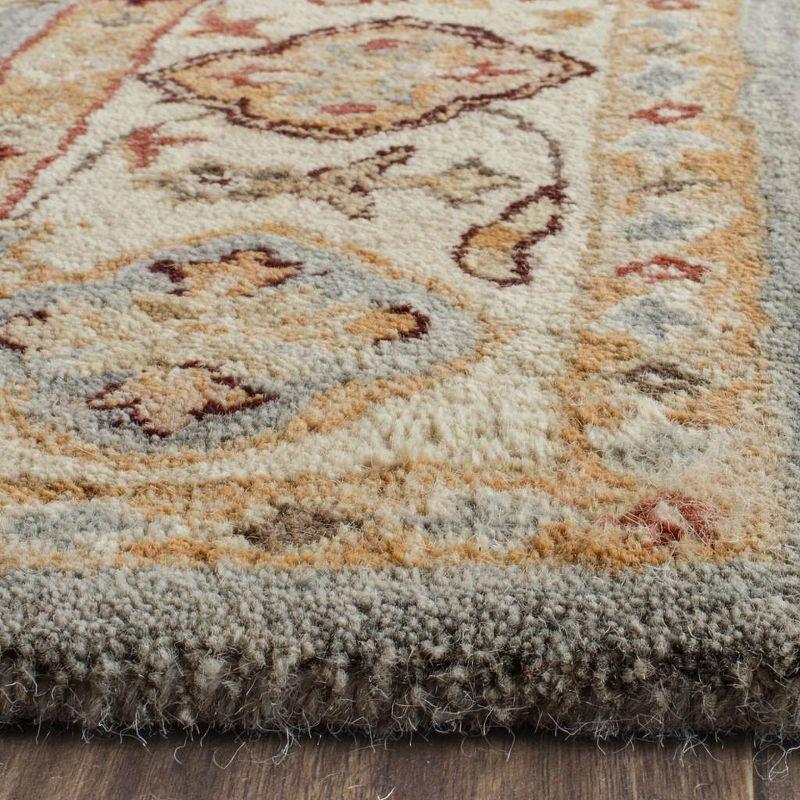Antiquity AT847 Hand Tufted Area Rug - Blue/Ivory - 5'x8' - Safavieh.