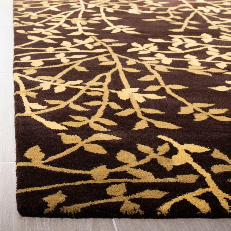 Soho SOH733 Hand Tufted Contemporary Area Rug  - Safavieh