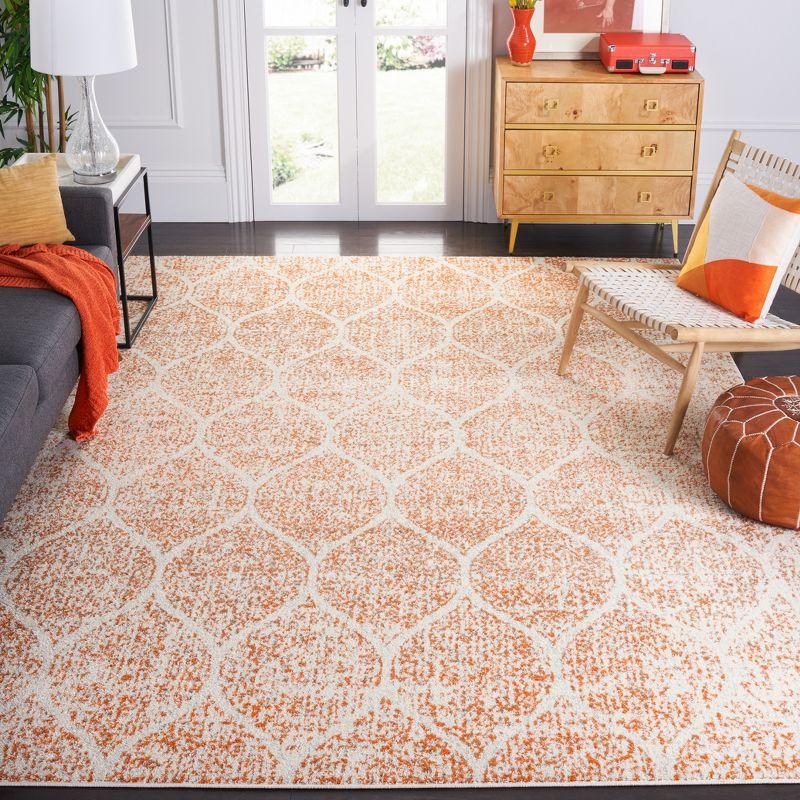 Cream/Orange Easy-Care Synthetic 9' x 12' Area Rug