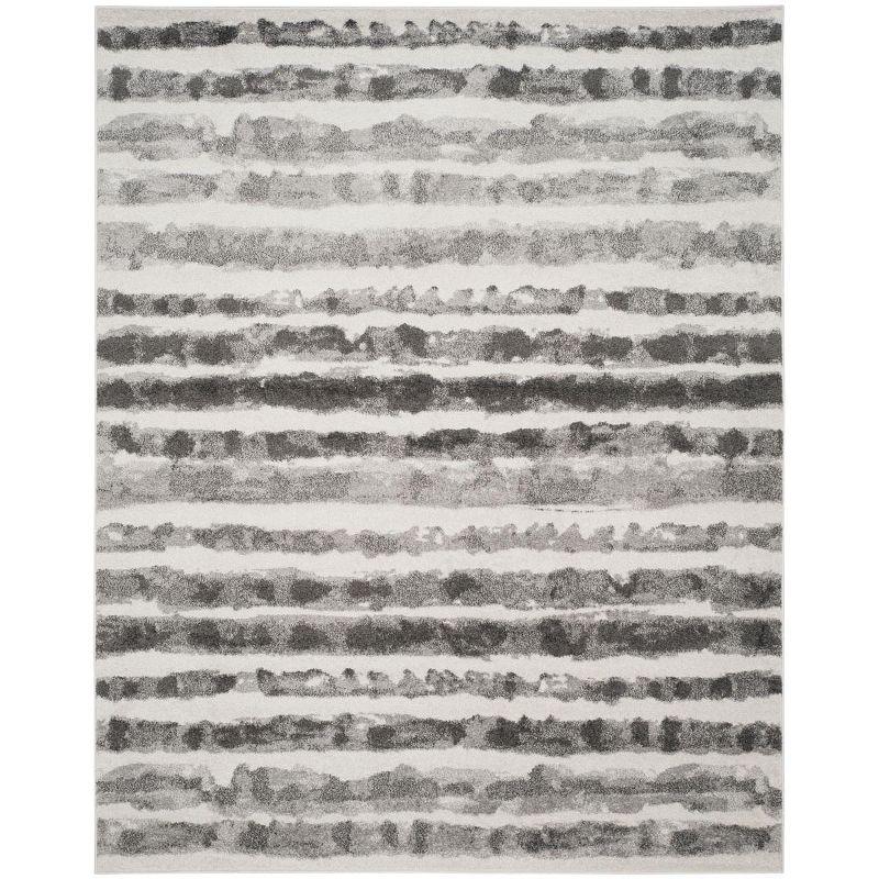 Ivory and Charcoal Striped 9' x 12' Easy-Care Synthetic Area Rug