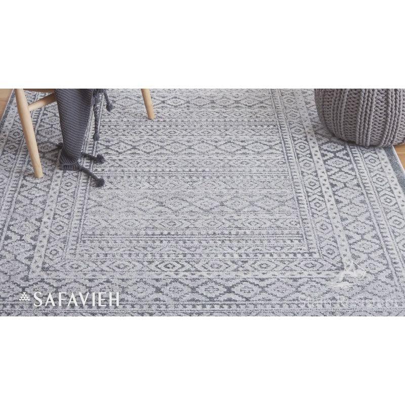 Abstract Gray and Ivory Synthetic 9' x 12' Hand-Knotted Rug