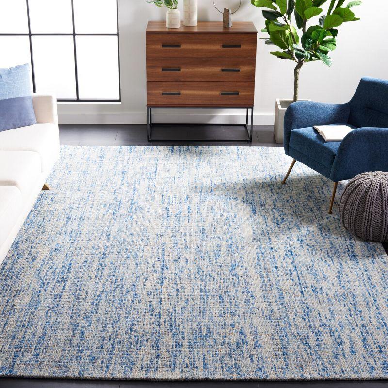 Hand-Tufted Abstract Wool Area Rug 8' x 10' in Dark Blue/Rust