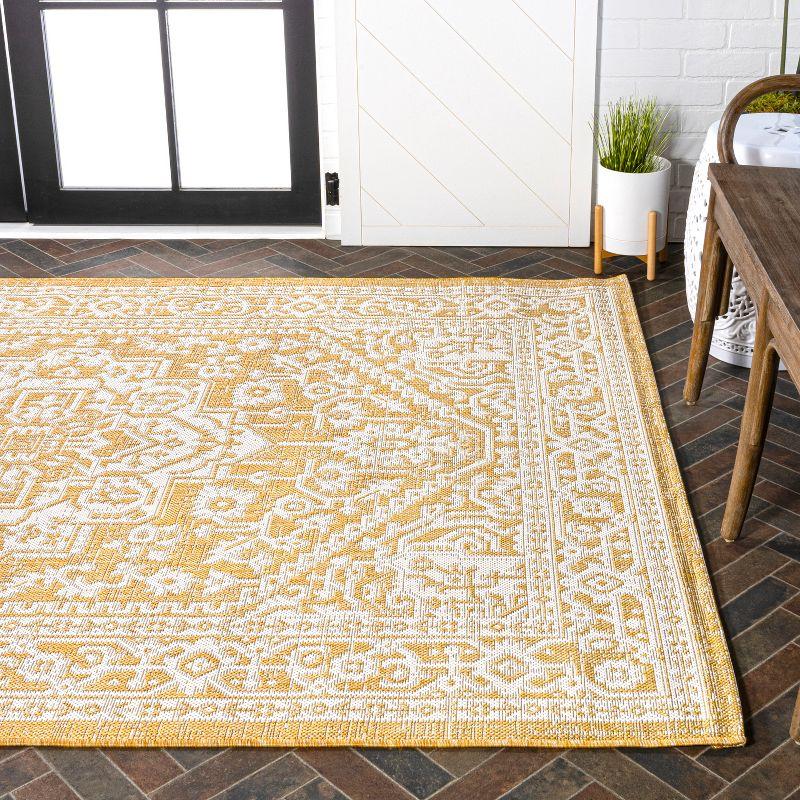 8' x 10' Sinjuri Medallion Textured Weave Indoor/Outdoor Area Rug, Yellow/Cream - JONATHAN Y