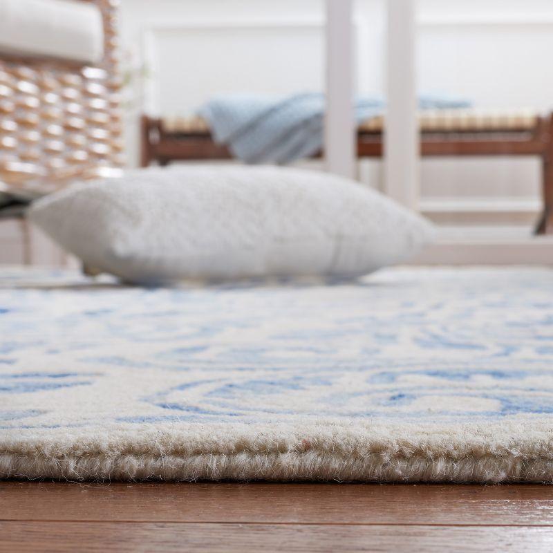 Blue and Ivory Hand-Tufted Wool 8' x 10' Area Rug