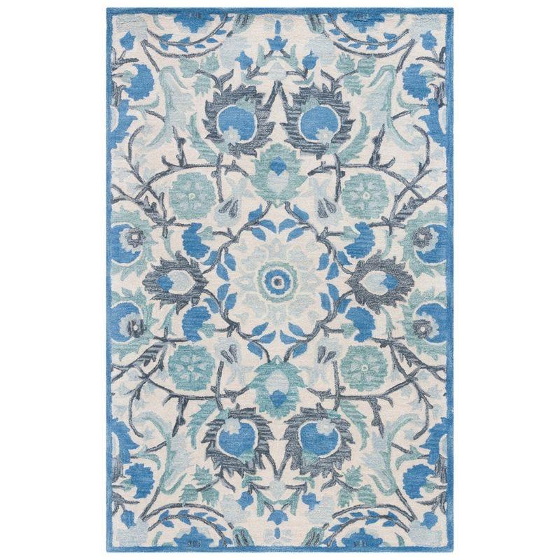 Antiquity AT59 Hand Tufted Area Rug - Ivory/Blue - 5'x8' - Safavieh.