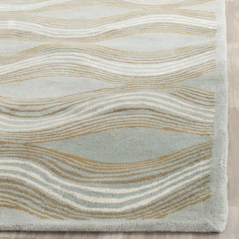 Blue and Beige Tufted Wool 6' x 9' Area Rug