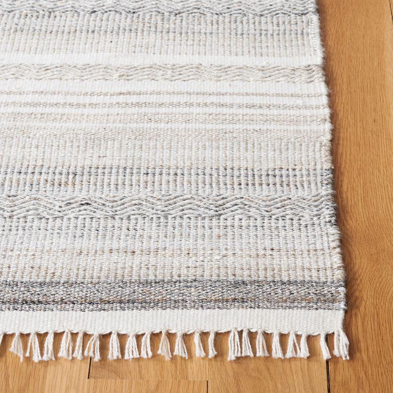 Ivory and Charcoal Flat Woven Synthetic Area Rug