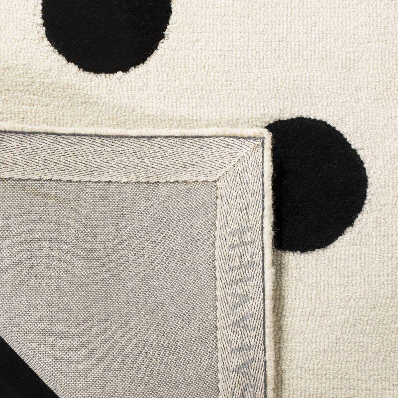 Safavieh Kids Polka Dots SFK904 Hand Tufted Indoor Area Rug - Ivory/Black - 6'x9' - Safavieh